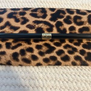 Cow Hyde Diane Von Ferstenberg clutch with black and gold detailing-pristine!